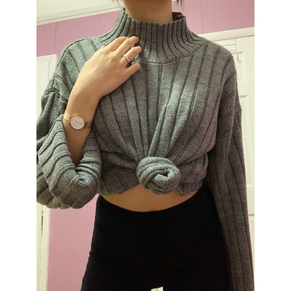 Grey turtleneck with large bell sleeves